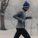 A runner braves the snow in Prospect Park in Brooklyn in February 2022.