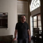 Barry Heitin, a 76-year-old retired lawyer who was the victim of a sophisticated online scam, at his apartment building in Arlington, Va. (Hailey Sadler/The New York Times)